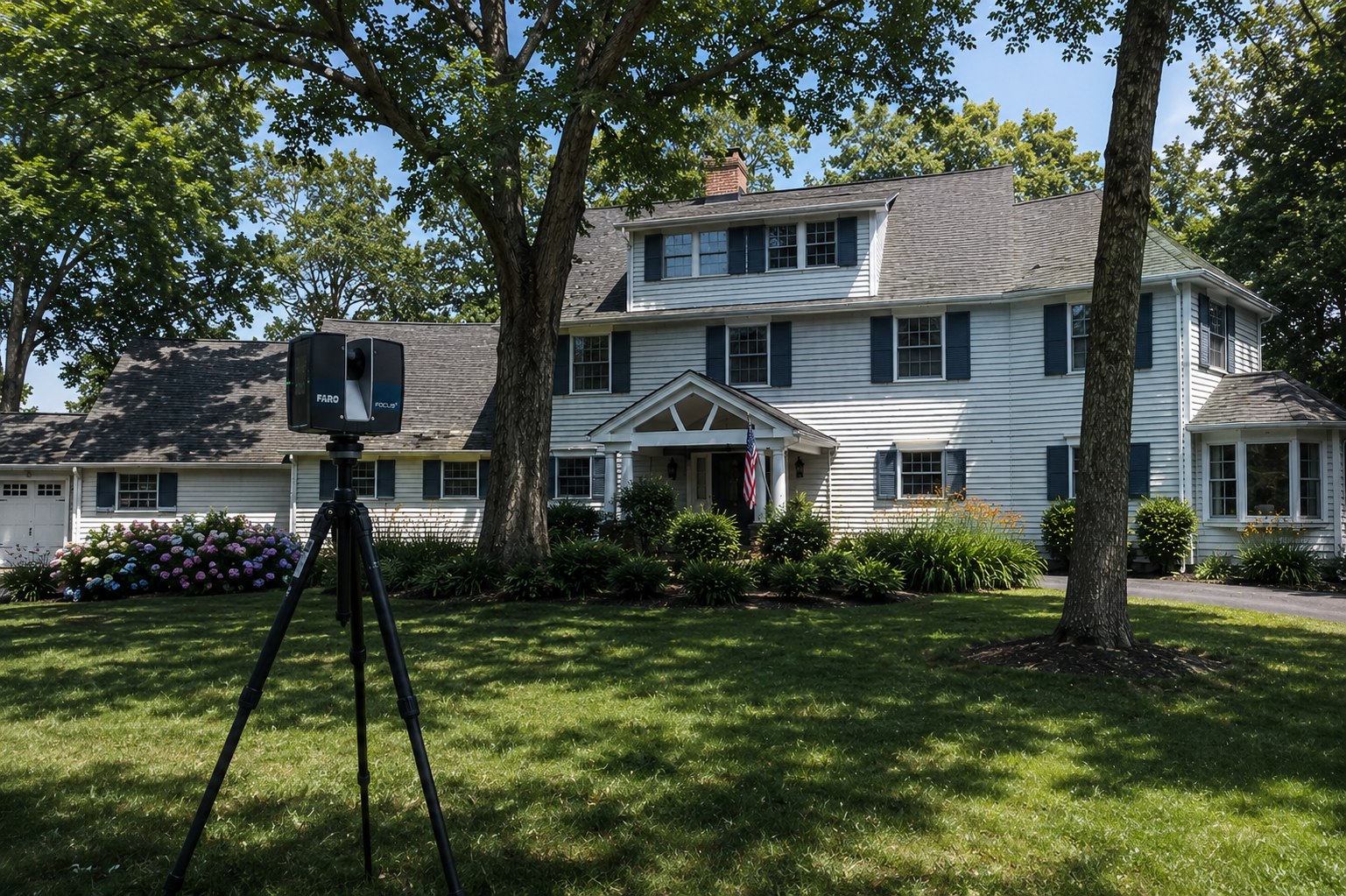 FARO laser scanner set up on the front lawn of a white clapboard colonial residence in Mountain Lakes, NJ
